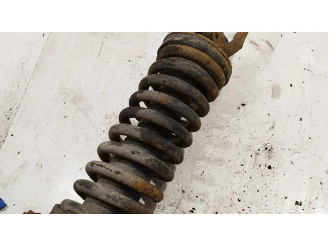 Передний амортизатор с пружиной