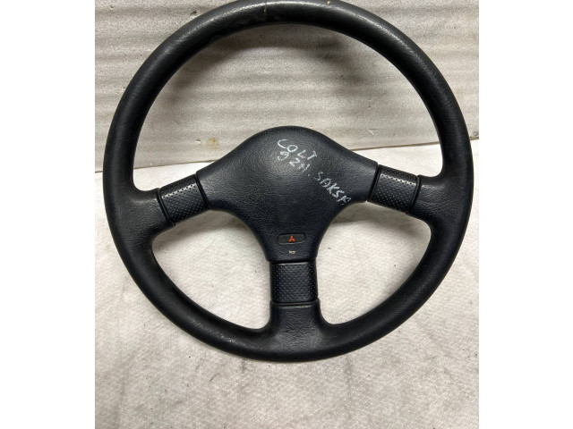 Руль Mitsubishi Colt 1989 - 1992 года MB564540, 1313