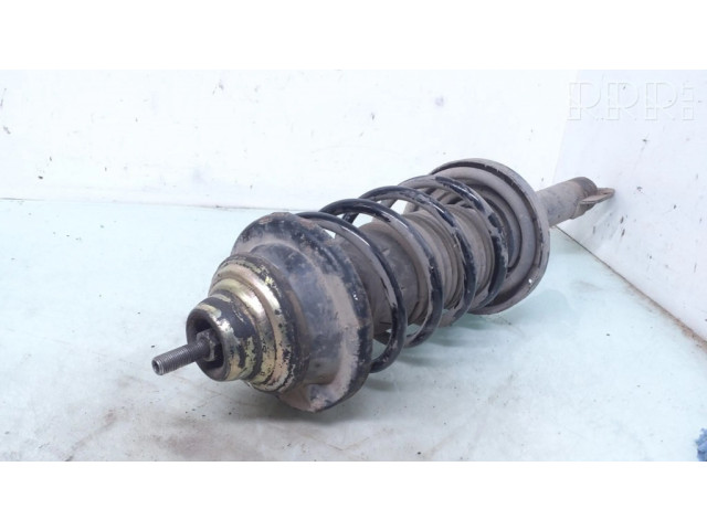 Передний амортизатор с пружиной      