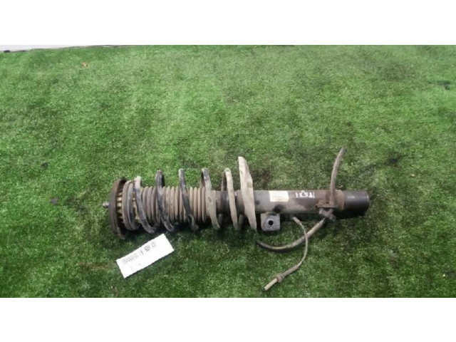 Передний амортизатор с пружиной      