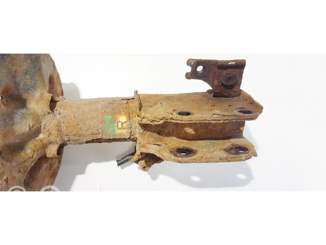 Передний амортизатор