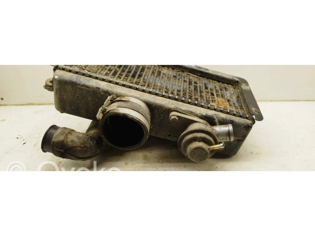 Интеркулер Subaru Forester SF 2.0