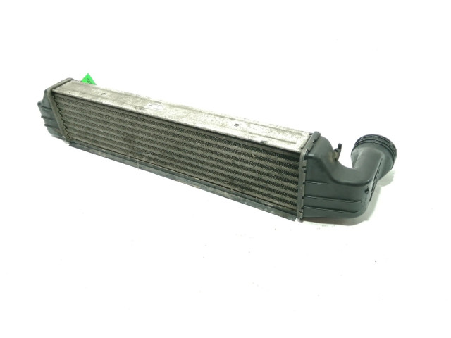 Интеркулер  1787779, 77897930   BMW X3 E83 