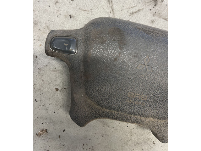 Подушка безопасности водителя BBAGZ83ZAPC, 047002606 Mitsubishi Pajero