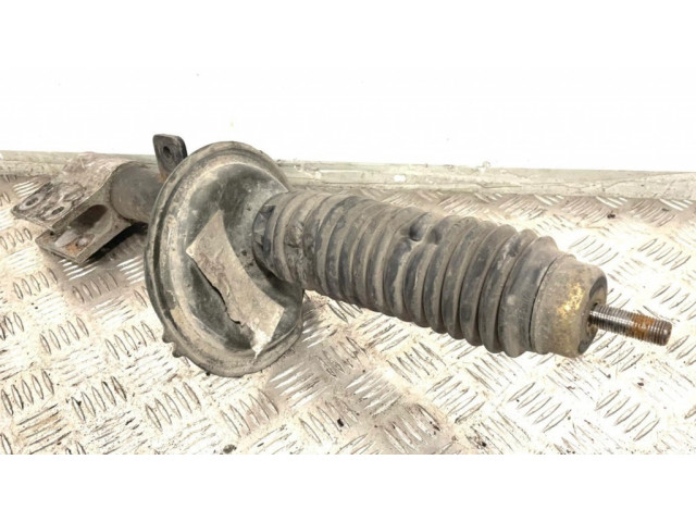 Передний амортизатор