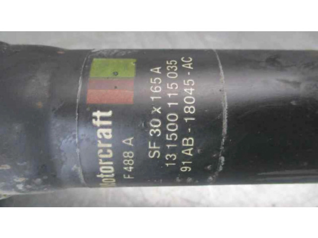 Передний амортизатор