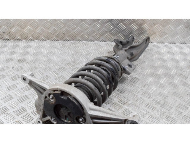 Передний амортизатор