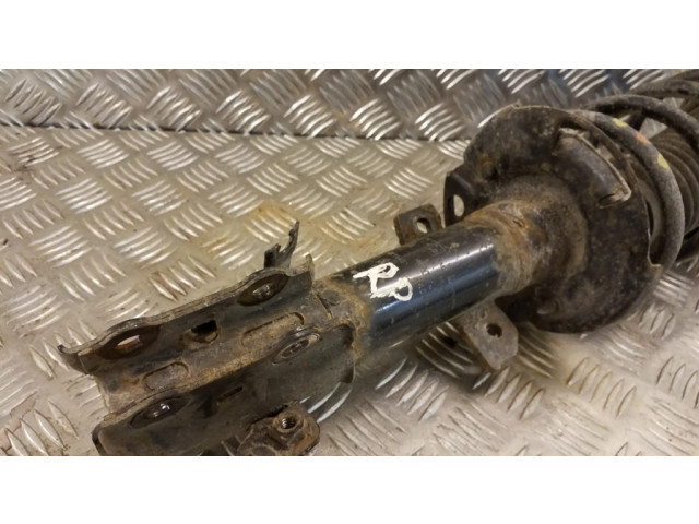 Передний амортизатор