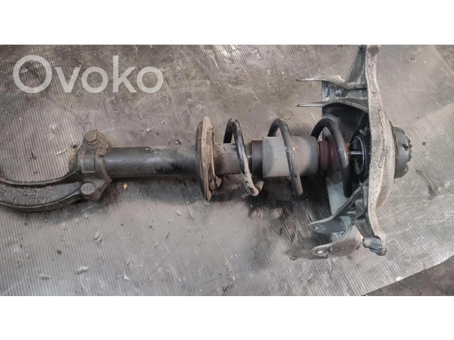 Передний амортизатор