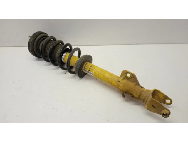 Передний амортизатор