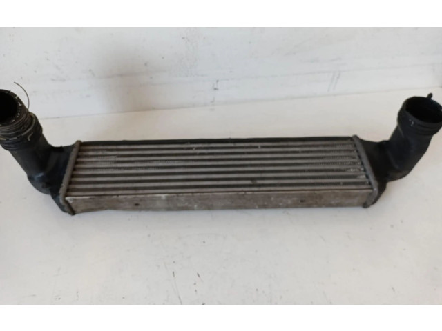 Интеркулер  77897930, 1787779   BMW X3 E83 