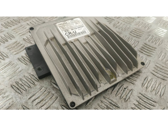 Řídící jednotka 391024X520   KIA Carnival 2003