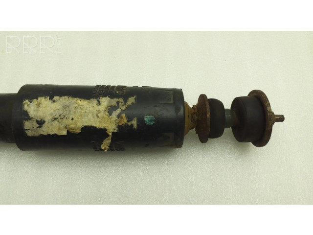 Передний амортизатор