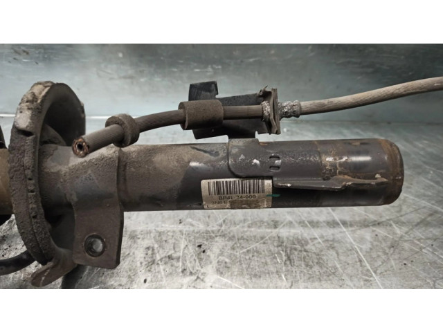 Передний амортизатор