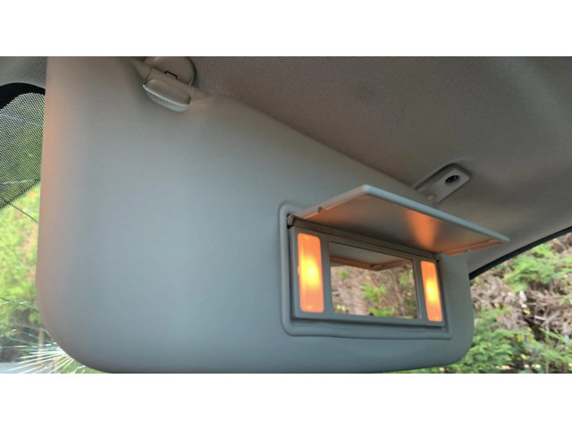 Держатель щитка от солнца