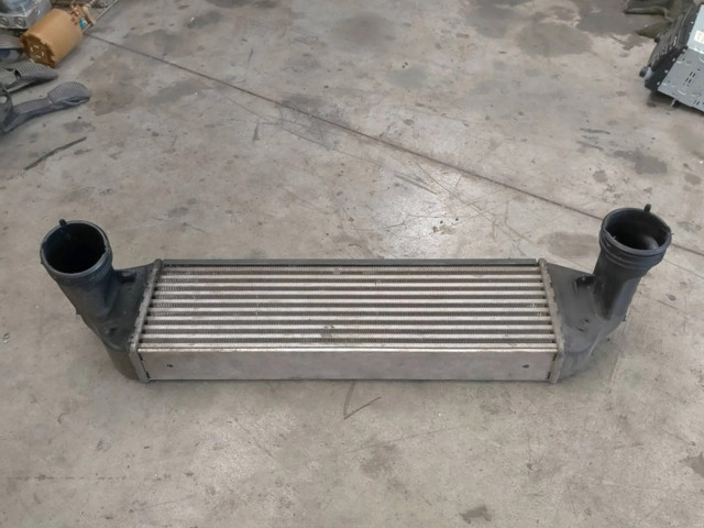 Интеркулер 17513453726 BMW X3 E83