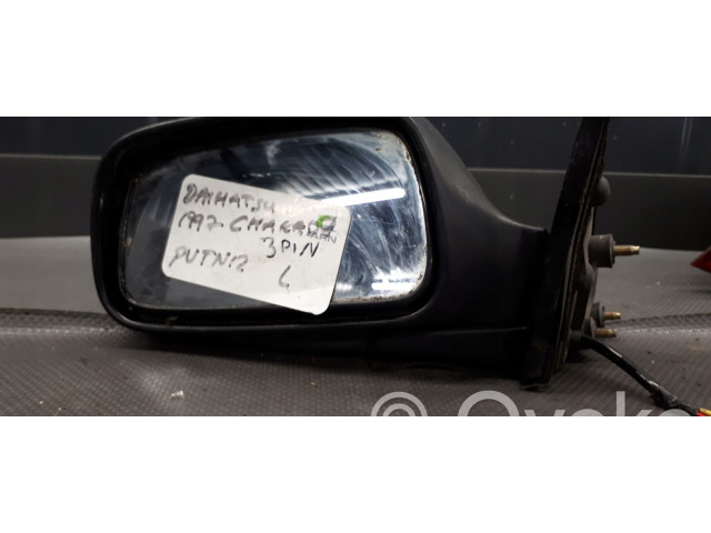 Зеркало электрическое левое Daihatsu Charade 1994-2000 года