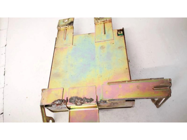 Řídící jednotka 2371066C00, a93-b71565 Nissan Sunny 1993