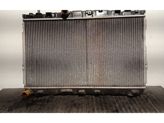 Радиатор охлаждающей жидкости    253102D000, 67494   Hyundai Coupe